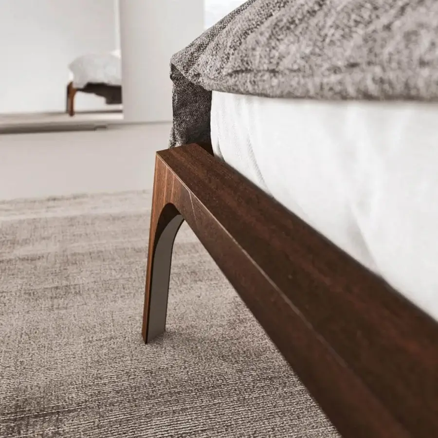 Distinguished Presotto Relevè bed with dark brown stained wood veneer, a straight headboard and short curved dark gray legs