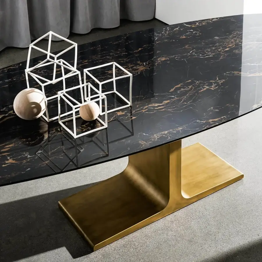 Superior Sovet Italia Palace table with a burnished metal base and glossy ceramic laminated tabletop in marble-patterned gold and white veining