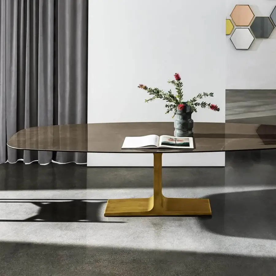 Distinguished Sovet Italia Palace table with oval laminated ceramic top in glossy dark brown and brushed matte golden metal base