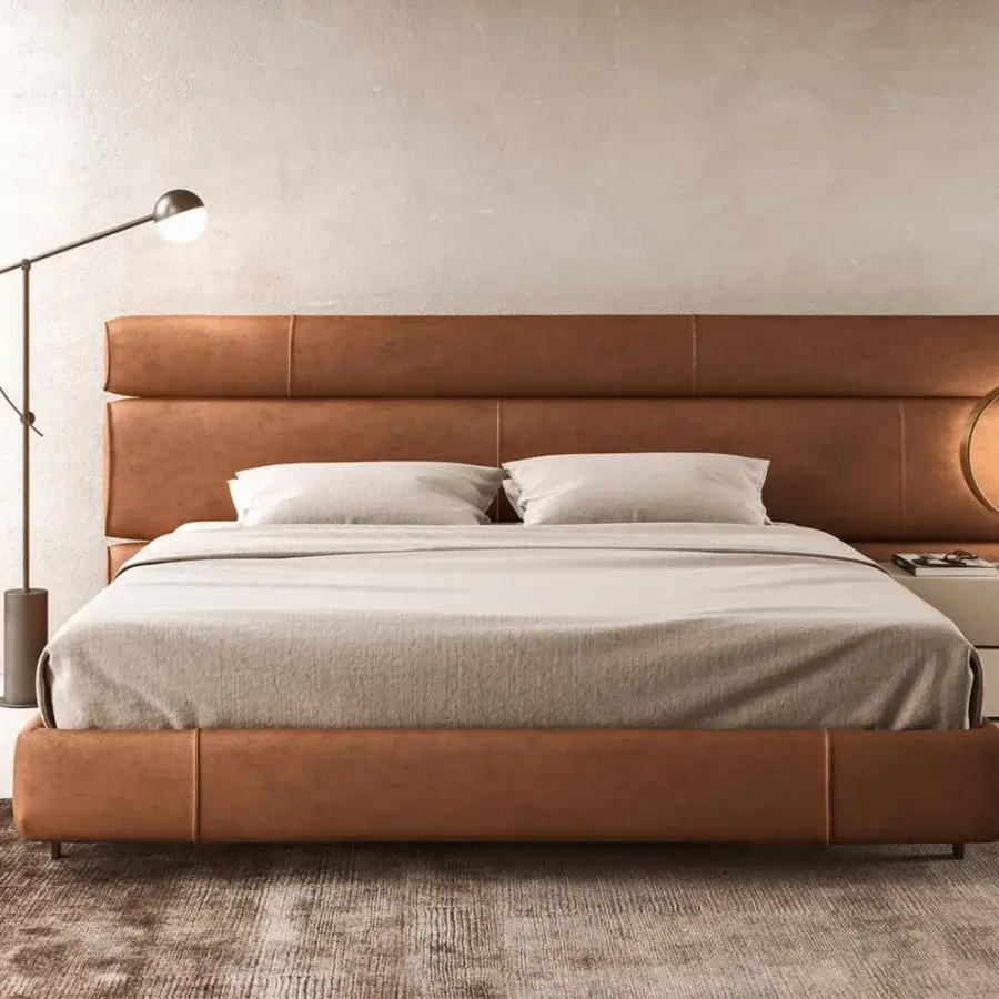 Distinguished Presotto Niobe bed with padded panels upholstered in medium brown leather and a matte finish