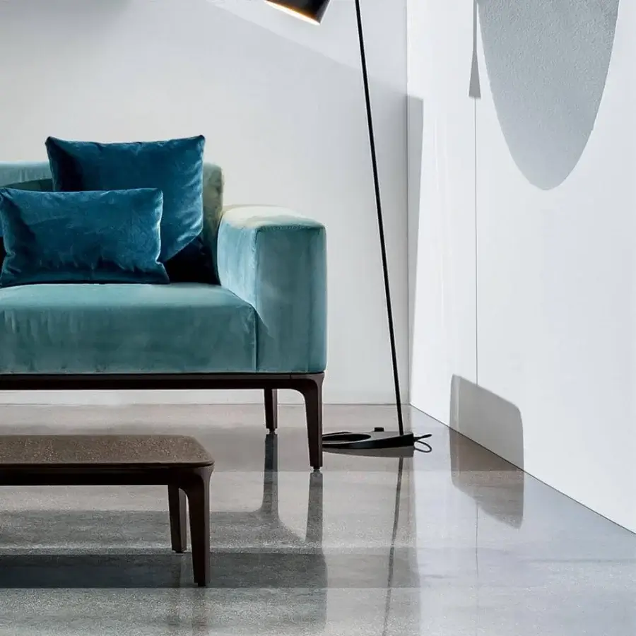 Elegant Sovet Italia Slim lounge chair with teal-blue European fabric upholstery and polished chrome finish