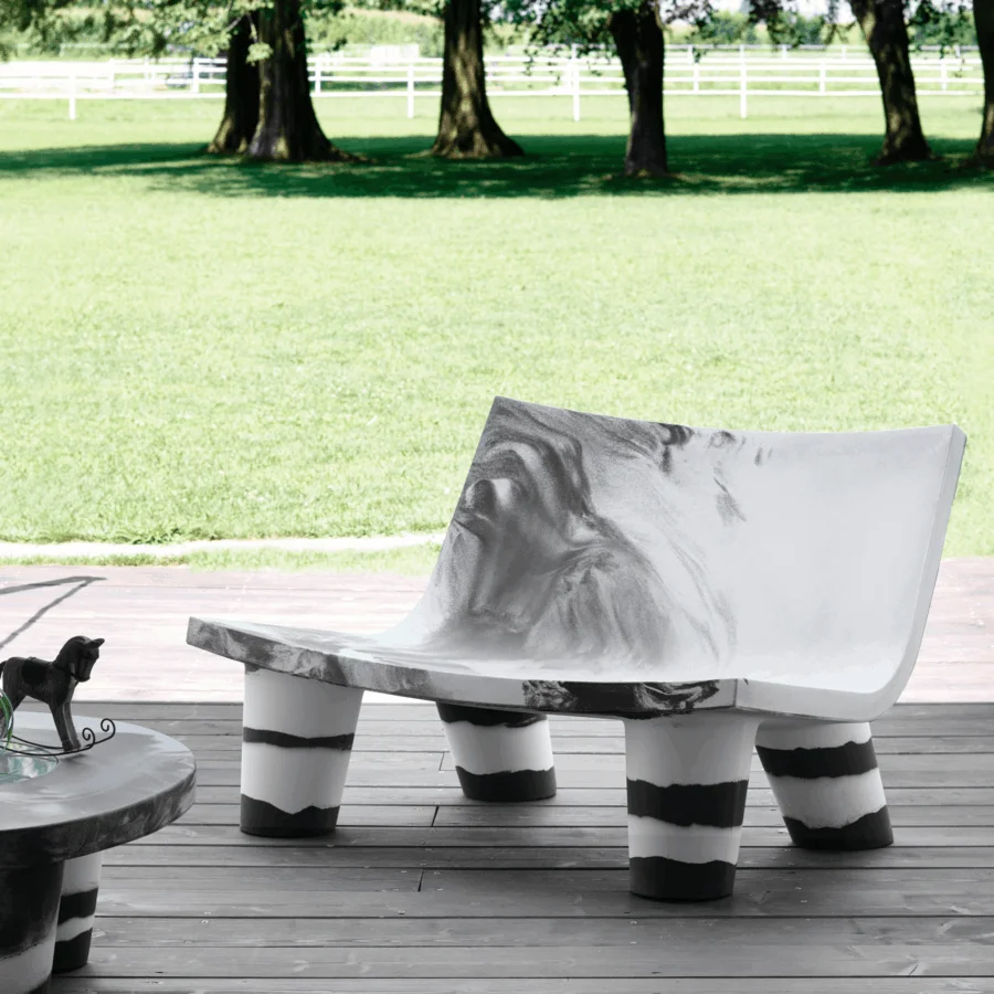 Exquisite Slide Low Lita Love sofa in white polyethylene featuring matte finish and abstract black marble pattern