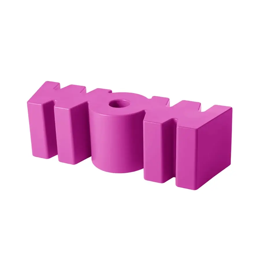 Luxury Slide Wow bench in magenta polyethylene with a smooth matte finish showcasing a sculptural fluid monolithic form
