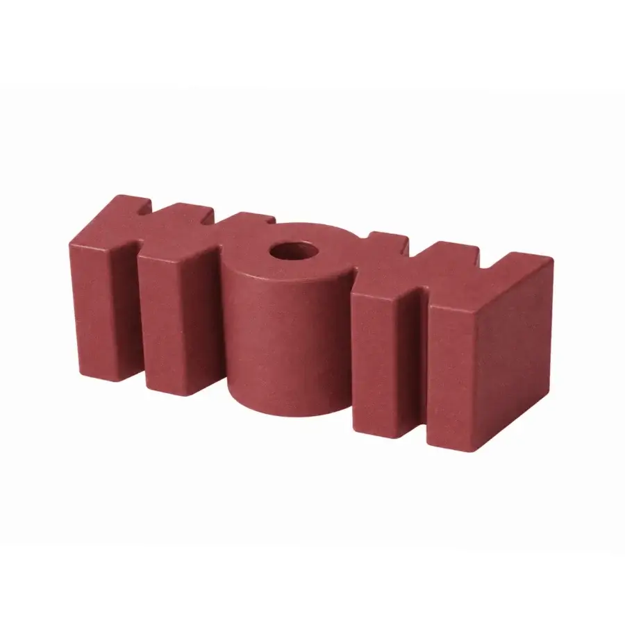 Innovative Slide Wow bench formed from durable polyethylene in muted terracotta red with matte textured finish