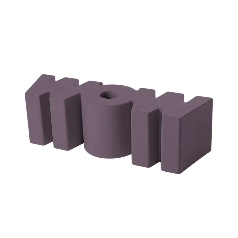 Luxury Slide Wow bench featuring sculptural monolithic form crafted from durable polyethylene in muted mauve matte finish