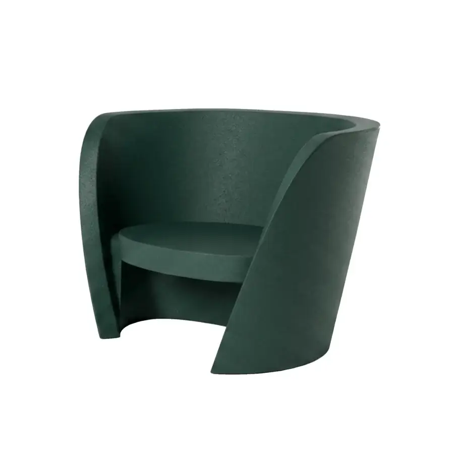 Luxury Slide Rap lounge chair in dark green polyethylene with a matte textured finish and fluid monolithic silhouette