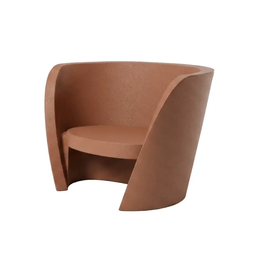 Luxury Slide Rap lounge chair crafted from durable polyethylene with a sophisticated matte terracotta toned finish