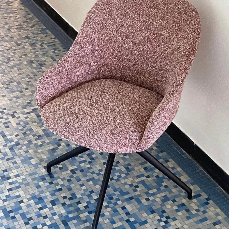 Elegant Potocco Lyz chair upholstered in textured textile with mottled light red, white, and brown tones with matte black metal legs
