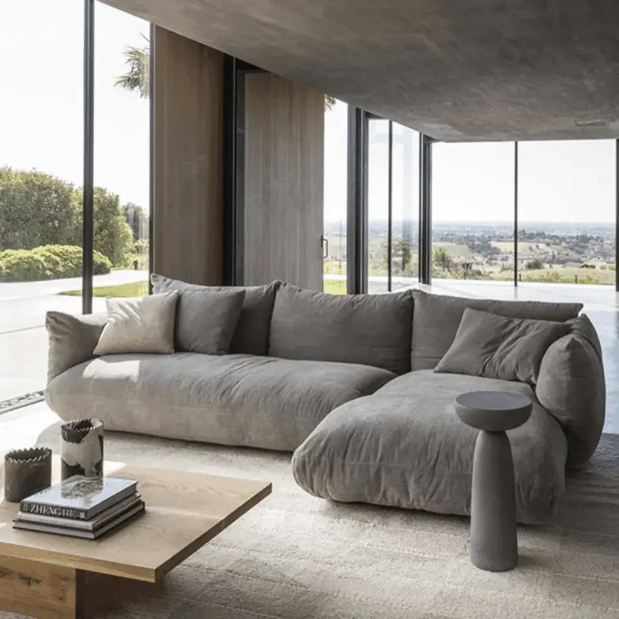 Luxury Mogg Alba sectional sofa in a plush voluminous modular design with textured medium-grey matte finish textile