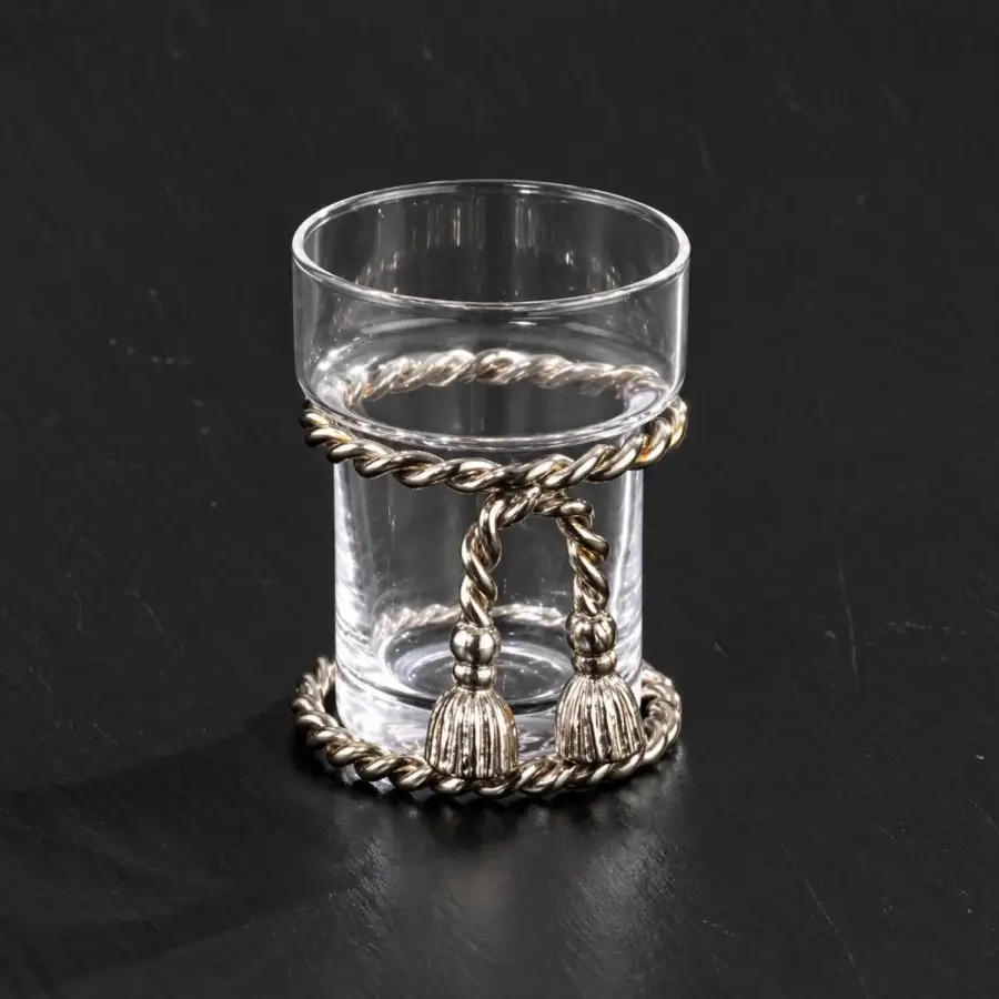 Sophisticated Selezioni Domus bathroom item featuring clear glass vessel with polished metallic rope band and silver tone metalwork