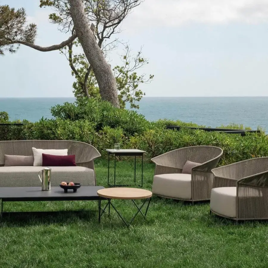 Distinguished Potocco Ola lounge chair with uniquely curved “Fly” ribbon in neutral beige and matte finish