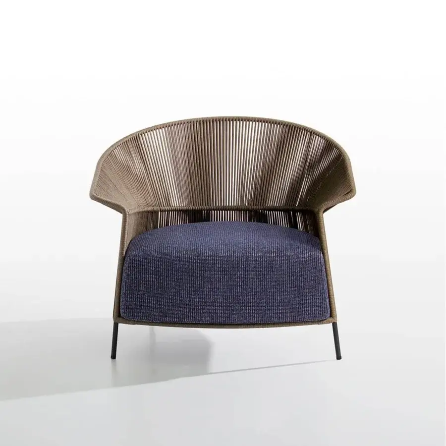 Distinguished Potocco Ola lounge chair with light brown hand-woven “Fly” ribbon back and dark blue woven outdoor fabric seat