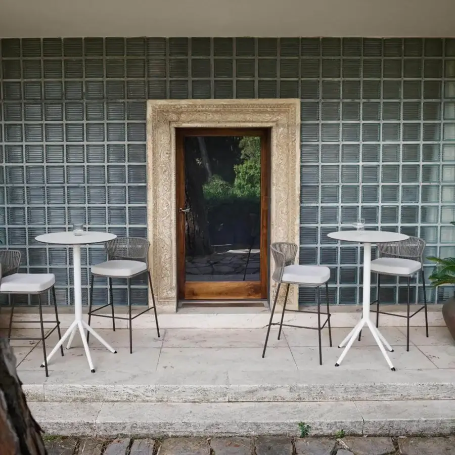 Exclusive Potocco Ola stool with light gray woven “Fly” ribbon and cushioned seat in outdoor fabric with matte dark metal legs