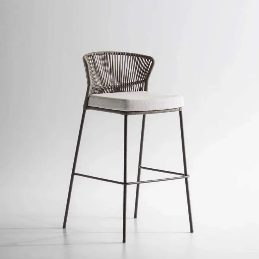 Elegant Potocco Ola stool with a slender metal frame and light gray cushioned seat woven in “Fly” ribbon