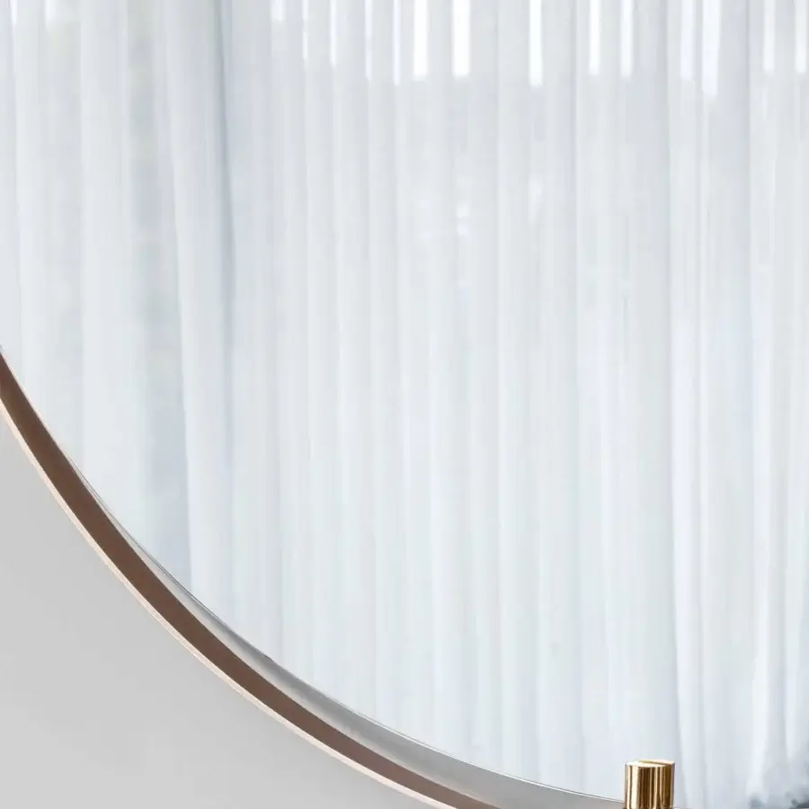 Superior Rugiano Ofelia mirror with round silhouette crafted in metal with bronze and glossy brass finish