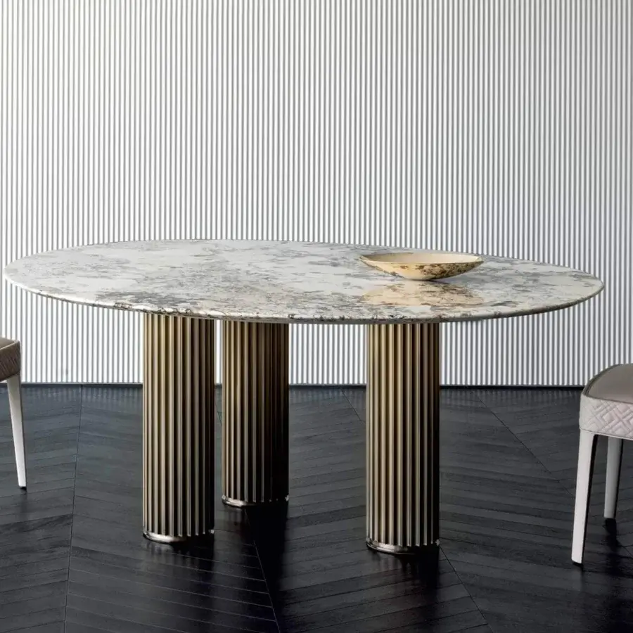 Distinctive Rugiano Liberty table with gray, cream, and beige marbled top and bronze finished aluminum extrusions