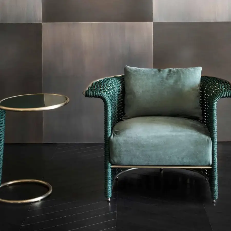 Sophisticated Rugiano Marina lounge chair with muted green velvety fabric upholstery and satin gold metal structure