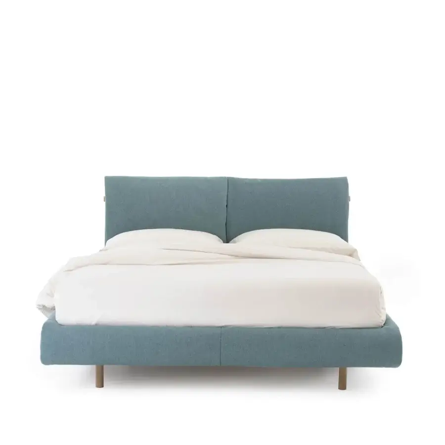 Luxury Noctis Mio bed in textured blue fabric with matte finish, clean solid wood frame and cylindrical legs