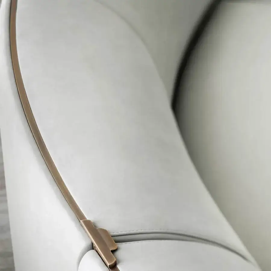 Superior Rugiano Pierre sectional with curved form upholstered in light textile and sophisticated bronze metal base crafted in Italy