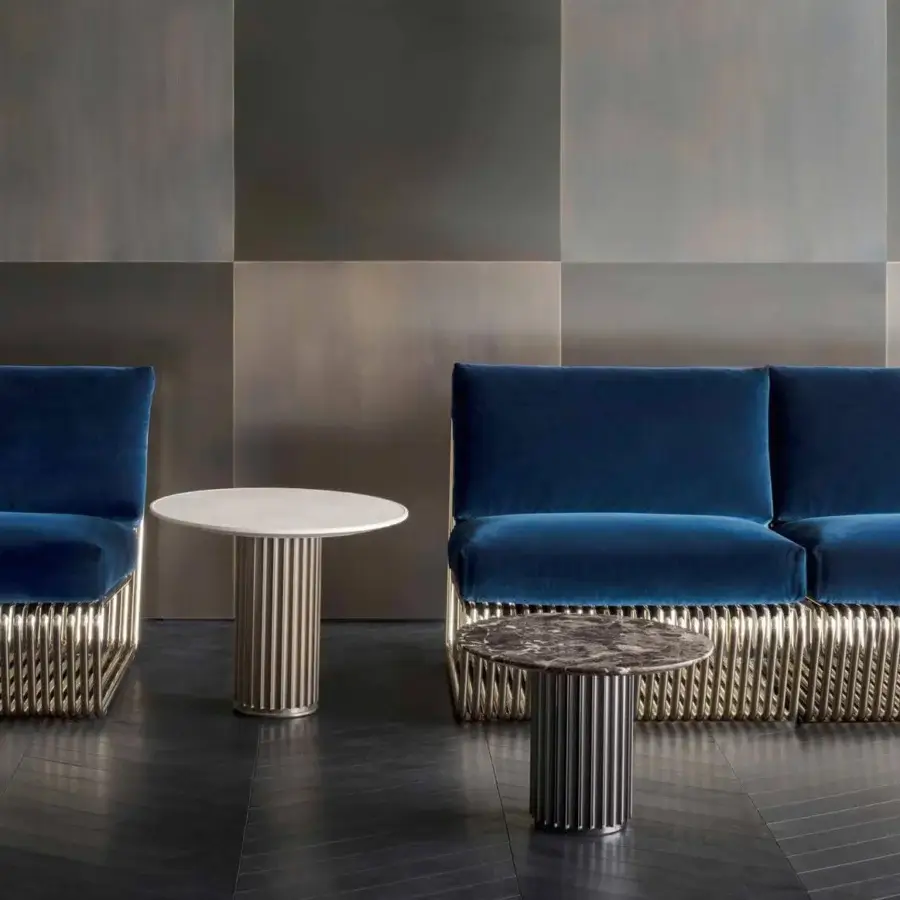 Elegant Rugiano Liberty coffee table with a round marble top and matte gray metal column-like base