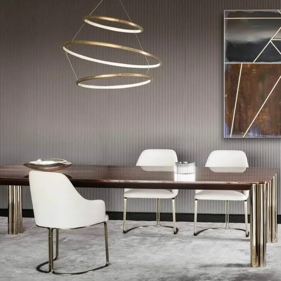 Exclusive Rugiano Marie armchair with curved lines and cream textile upholstery built with a bronze metal base