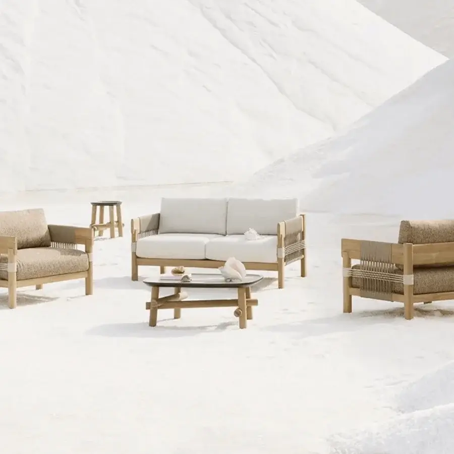 Exquisite Unopiù Cora Sofa showcasing solid teak wood, woven synthetic rope, and soft beige cushions