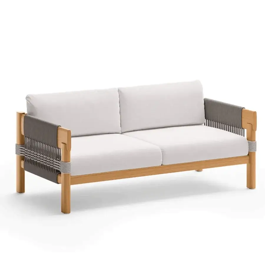 Sophisticated Unopiù Cora sofa featuring solid teak and dark grey woven rope side panels with light neutral fabric cushions
