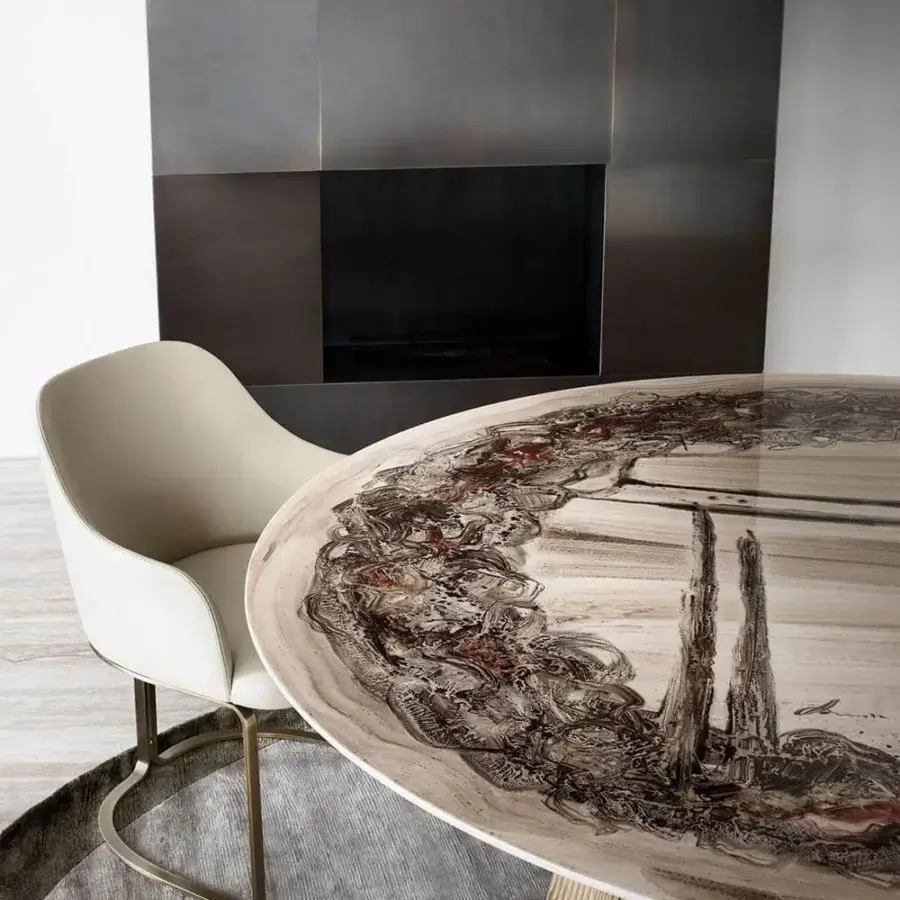 Exclusive Rugiano Alyson round table with skillfully curved light gold metal tubes and swirling shades of brown, gray, white, and red artistry