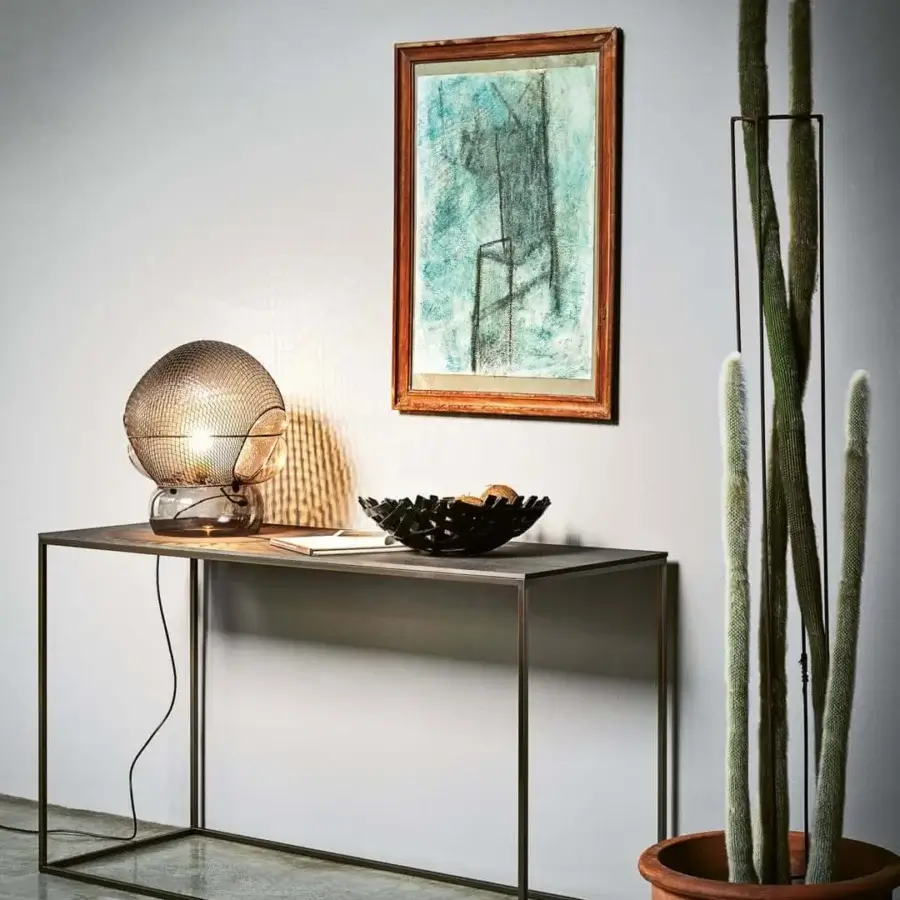 Elegant Desalto Helsinki 15 console featuring steel structure and aluminum joints in dark bronze and brownish grey tones