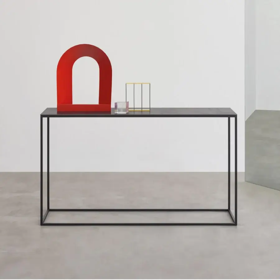 Elegant Desalto Helsinki 15 console in slender steel tube structure with minimalist geometry and matte black lacquer finish
