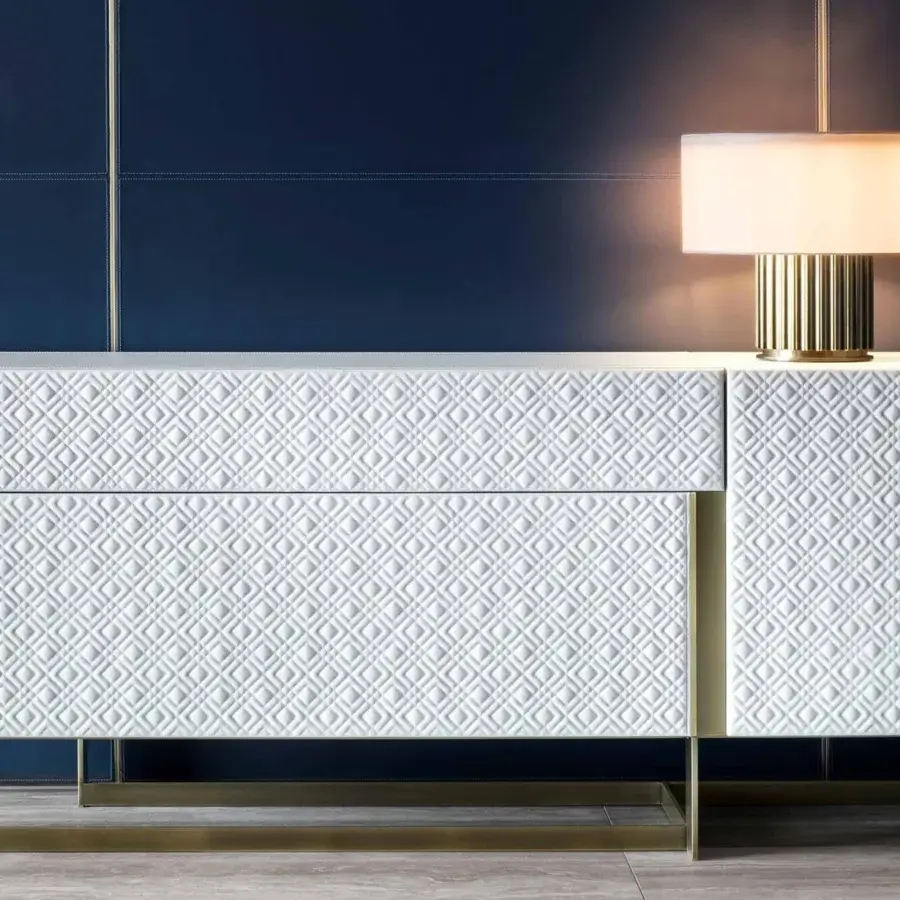 Distinctive Rugiano Liberty table lamp with a light-beige textile cylindrical shade and glossy gold finished aluminum tubes