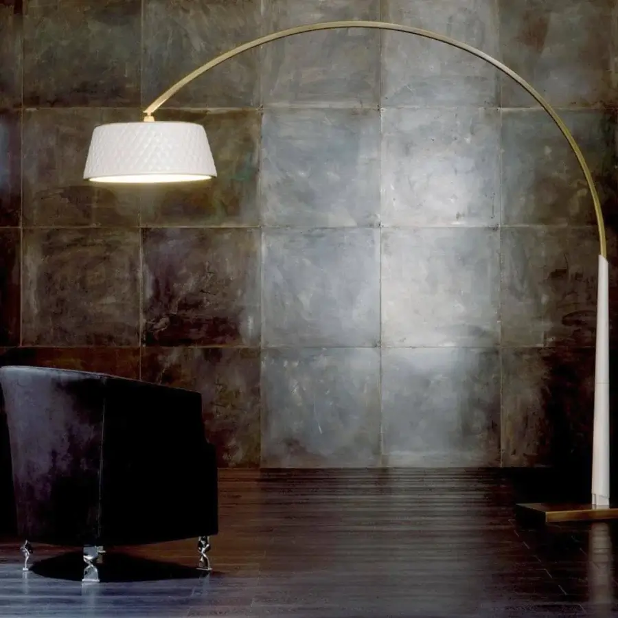 Elegant Rugiano Joanne floor lamp with warm brass metal structure and quilted white textile lampshade crafted in Italy