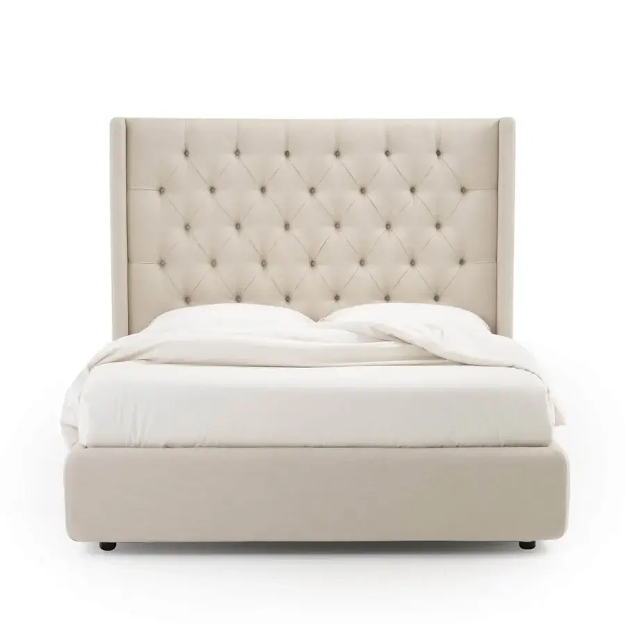 Luxury Noctis Star bed in light neutral textile with hand-worked capitonné tufting and angular winged silhouette base