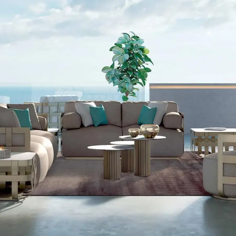 Exceptional Rugiano Dafne lounge chair with bronze painted aluminum basket structure and light tan fabric cushions