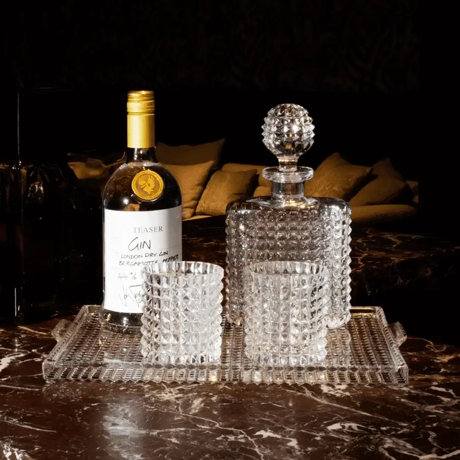 Luxury JR Home by John Richmond Nora tumbler in mouth-blown lead crystal with clear finish and faceted pyramid pattern