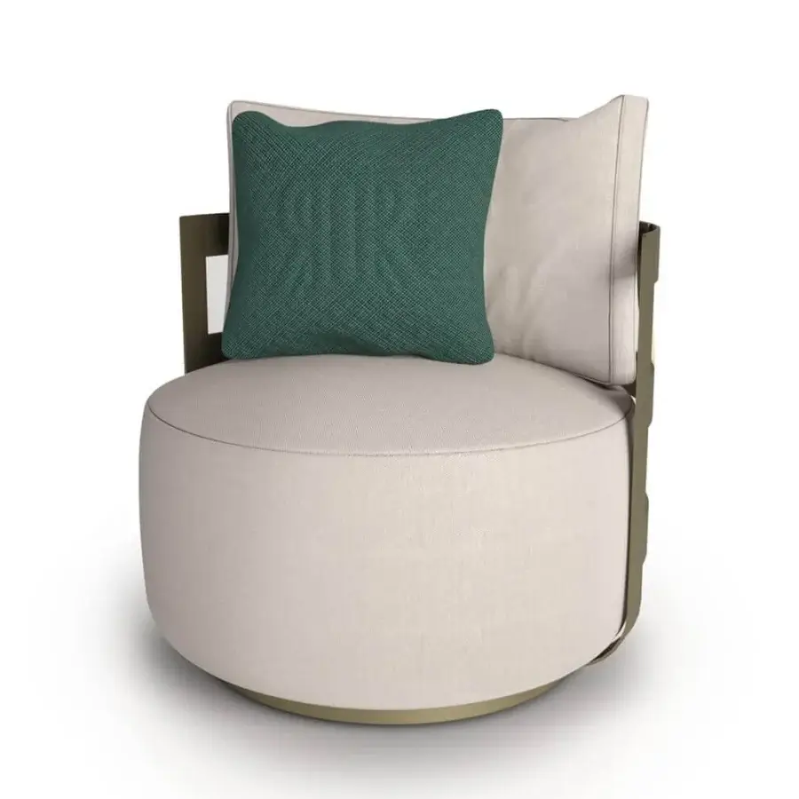 Lavish Rugiano Dafne lounge chair with bronze painted aluminum basket and light beige fabric upholstery complemented by a deep green pillow