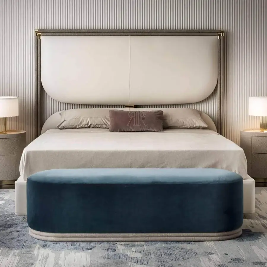 Distinguished Rugiano Boheme bed with light beige textile and smooth darker leather upholstery in bronze finish