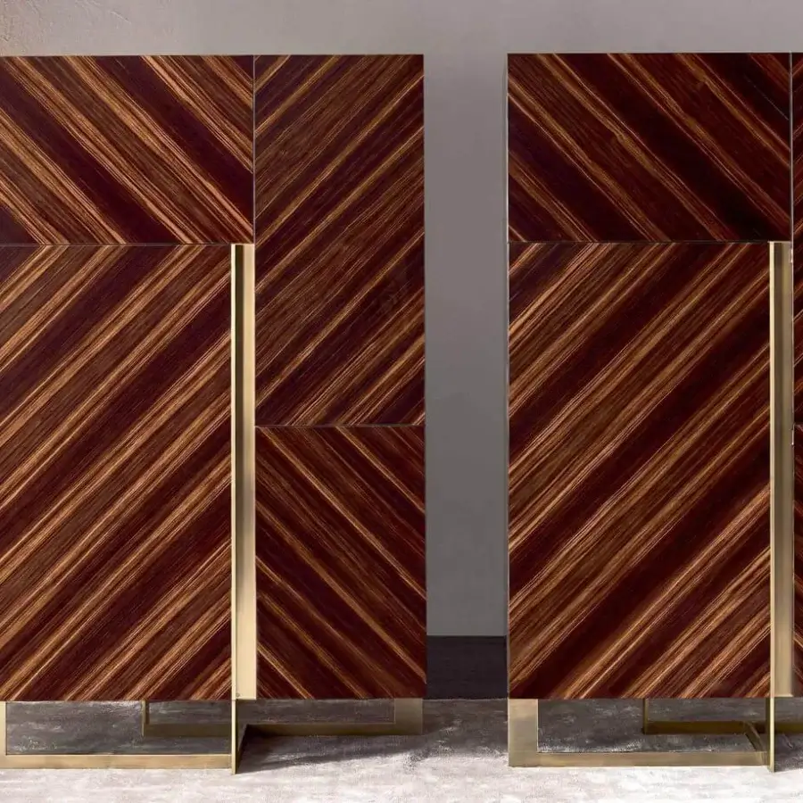 Distinguished Rugiano Blade cupboard with ebony wood and a metallic base, showcasing a glossy finish and striking wood grain pattern