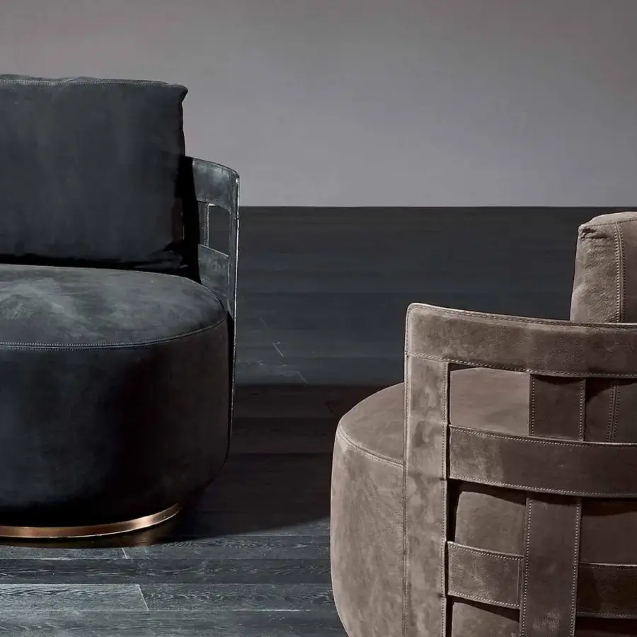 Exclusive Rugiano Braid lounge chair with braided hide-leather structure and fabric cushions in lighter brown tones