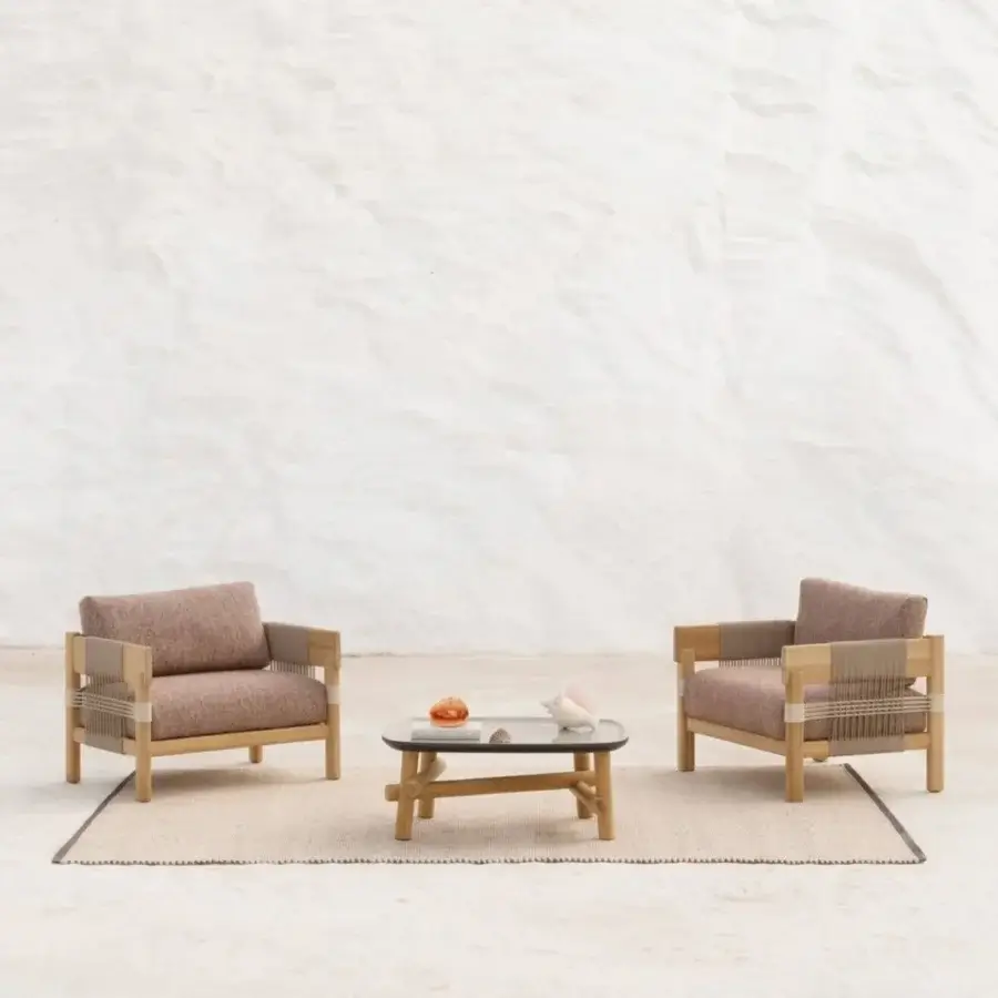 Luxury Unopiù Symi coffee table in natural teak with sleek ceramic tabletop in a refined Dove finish and cylindrical legs