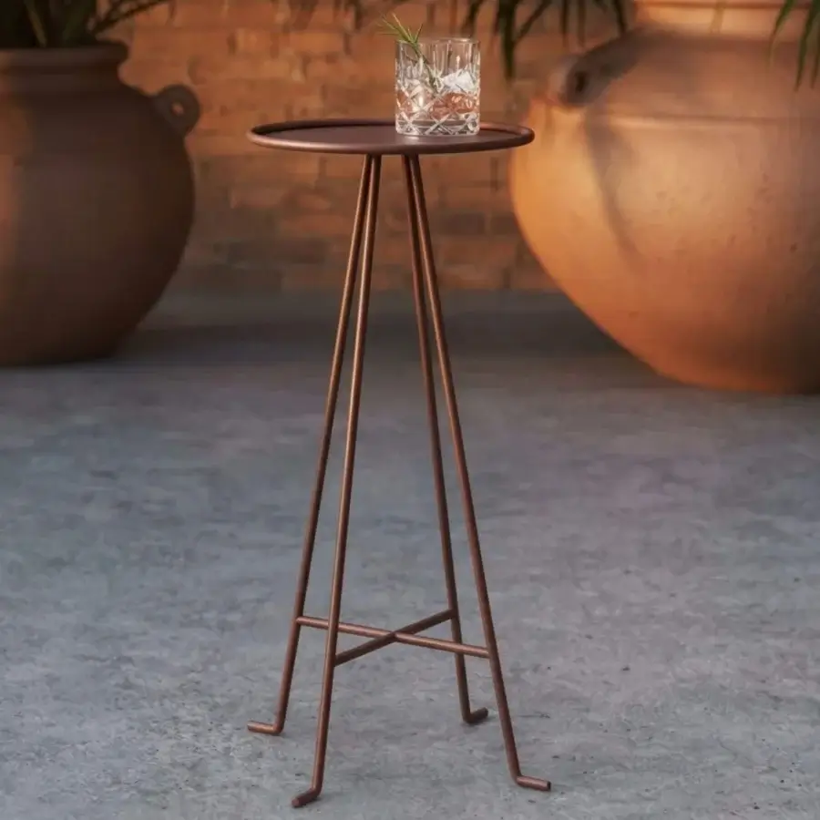 Luxury Unopiù Syros side table crafted in Italy from metal with a refined matte Terracotta finish and angled tripod legs