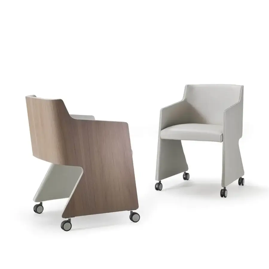 Elegant 4 Mariani Ophy armchair fully upholstered in light gray synthetic material with a geometric silhouette and caster wheels