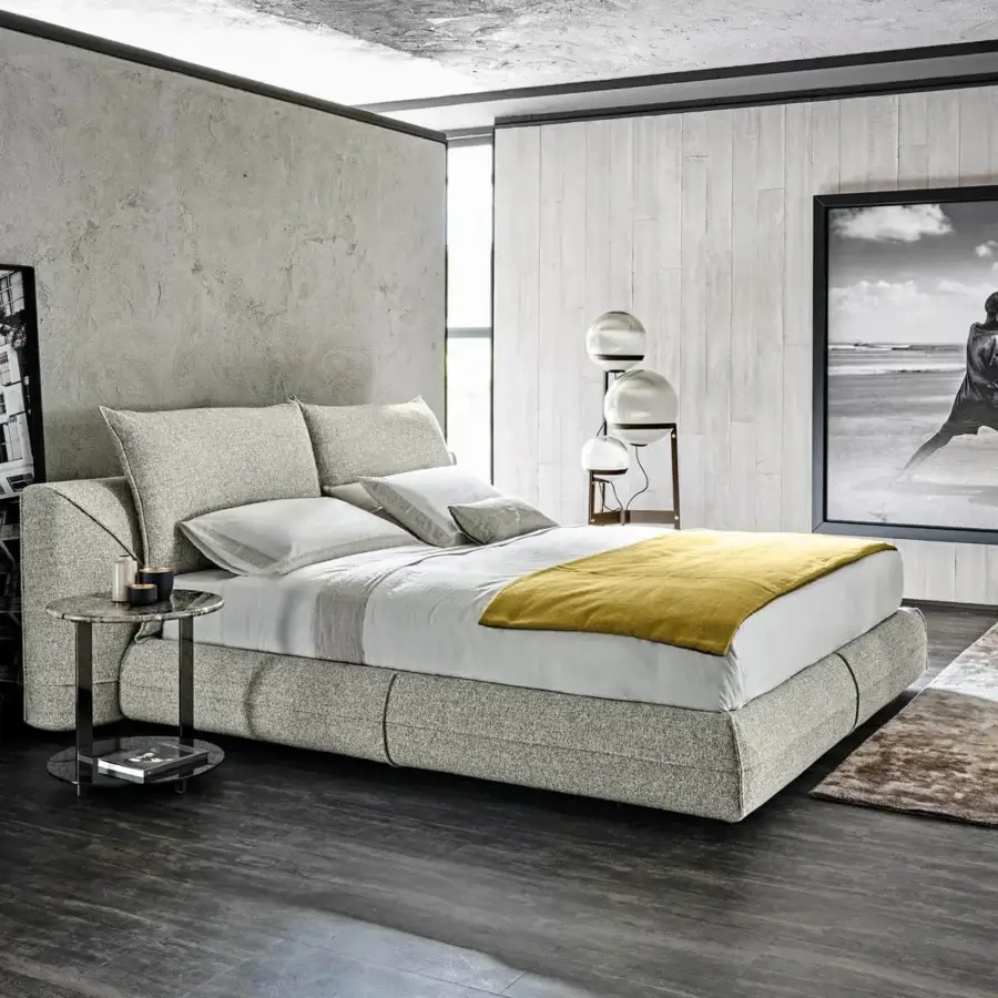 Exclusive Arketipo Starman Dream bed with grey and white speckled fabric upholstery and curved lines