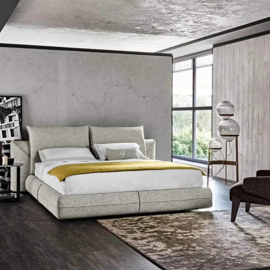 Distinctive Arketipo Starman Dream bed with light gray and beige speckled fabric upholstery and powerful contours