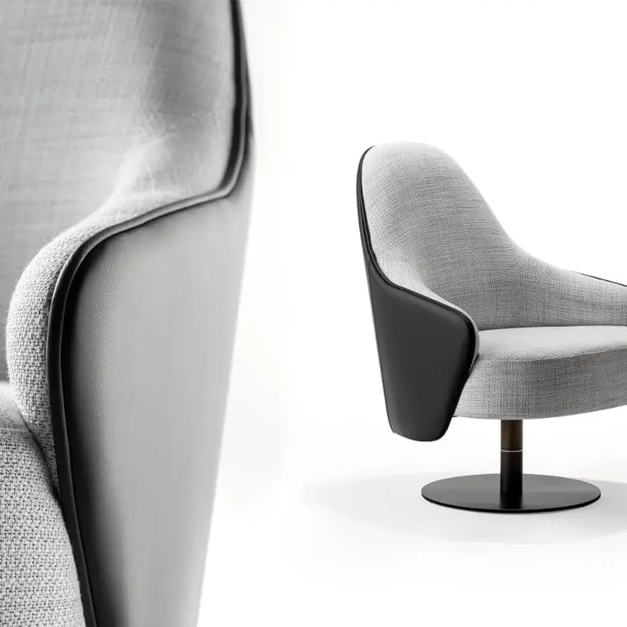 Refined Reflex Ludwig lounge chair with woven light gray and dark gray upholstery, built with a matte metal base