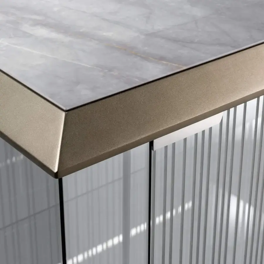 Distinguished Reflex London cupboard with reeded doors, bronze border and marble glass back panel