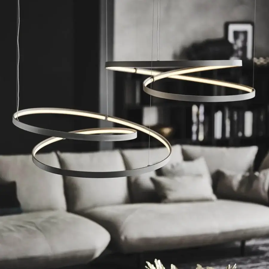 Elegant Cattelan Italia Heaven suspension lamp with interconnected titanium embossed lacquered metal rings emitting warm white light