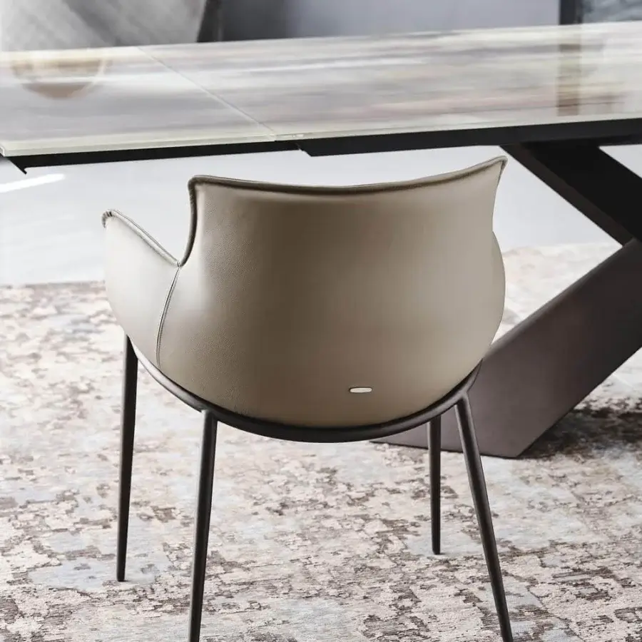 Elegant Cattelan Italia Rhonda armchair in soft taupe leather with dark bronze embossed lacquered steel legs