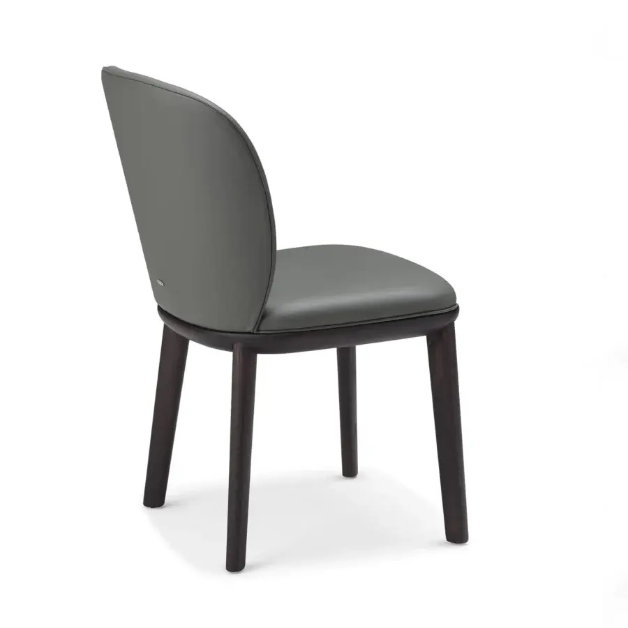 Superior Cattelan Italia Chris chair with curved backrest and squared seat in gray-green synthetic leather with open pore matt black ashwood legs