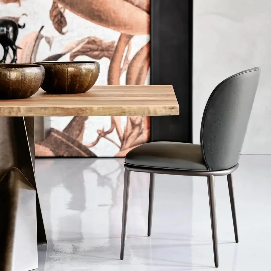 Exceptional Cattelan Italia Chris chair with curved backrest in matte gray soft leather and matching steel finish